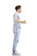 A man, on a white background, in full height, spreads his arms © Katsiaryna