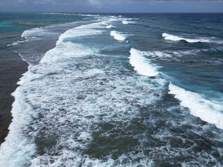 Aerial view with high view of the reef break in san andres island Colombia

