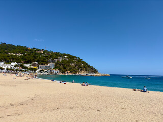 Fototapeta premium beautiful bay with beach and marina with yachts in the village Llafranc, Camí de Ronda, Costa Brava, Girona, Catalonia, Spain