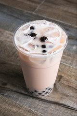 A view of a rose milk tea drink.