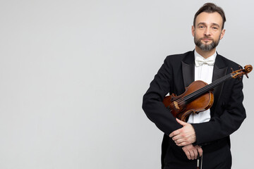 Musician man with violin at concert