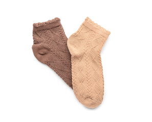 Different basic color socks on white background