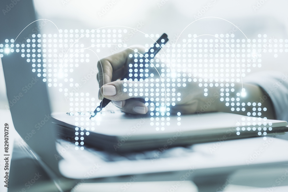 Poster abstract creative world map with connections and hand writing in notebook on background with laptop,