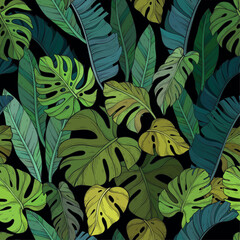 Seamless pattern with Green leafs of monstera on black background