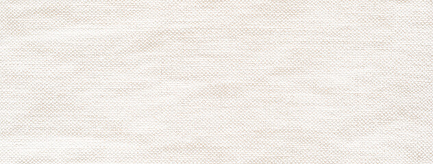 A detailed close-up showing the coarse texture of a light-colored linen fabric, highlighting the...