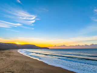 Sunrise seascape views with high cloud