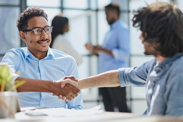 Successful Corporate Cooperation: Professional Business Partners at Indoor Office Meeting