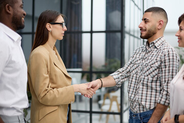 meeting new partners in the office corrido