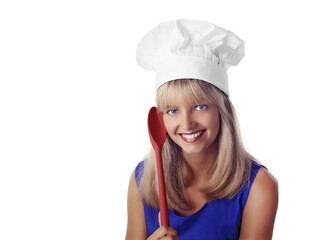 beautiful smiling blonde chef with colorful spoon on neutral background