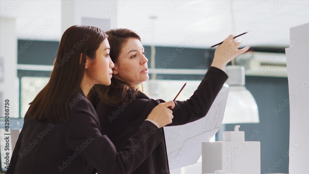 Poster design group interprets dimensions working in real estate brokerage headquarters. planners team crea
