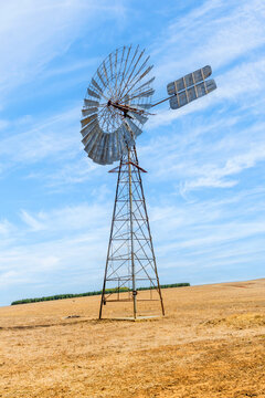 Old-fashioned traditional metal windmill in a remote prairie landscape, Western Australia, Australia