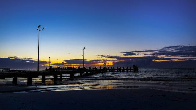 Silhouette of a jetty at sunset, Lancelin, Western Australia, Australia
