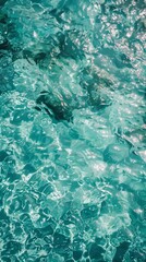 Obraz premium Aerial view of crystal clear turquoise water, ocean texture, sea surface.