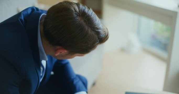 Angry Businessman Devastated by Finances