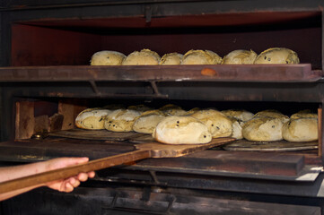Seed bread baking in industrial oven