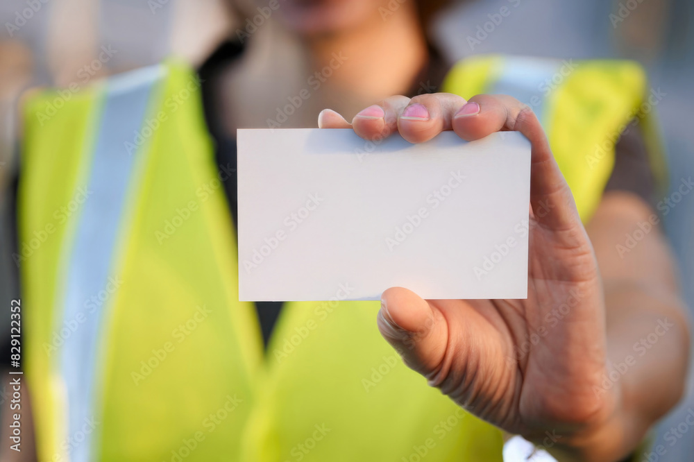 Wall mural person holding blank card