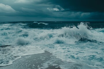 Fototapeta premium Stormy ocean waves crashing on the shore
