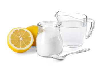 Baking soda in jar, vinegar and lemons isolated on white