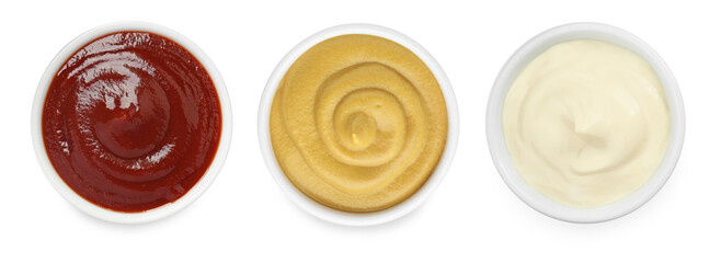 Set of different sauces in bowls isolated on white, top view