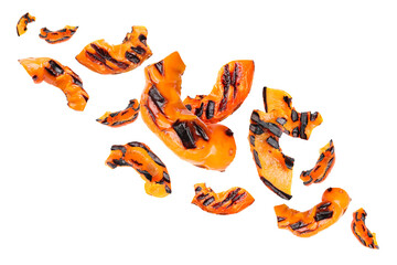 Slices of grilled bell peppers in air on white background