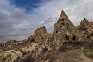 Fototapeta premium landscape overlooking the rocks of the ancient city Cappadocia in Türkiye.