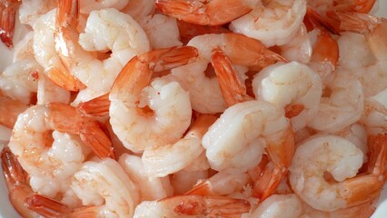 Shrimp: low calorie, fat, high protein, nutritious. Rich in selenium, vit. B12, phosphorus, iodine. Higher cholesterol than some seafood options. Food concept. Seafood background. 
