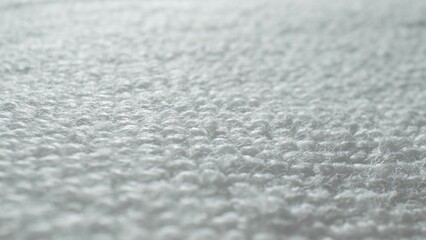 Obraz premium A close-up unveils a serene landscape of white, pillowy loops. Each delicate strand intertwines, forming a cozy fabric that whispers of warmth and comfort, inviting you to sink into its embrace. 
