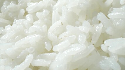 Jasmine rice, steamed to perfection, shines with a pearly lustre. Each grain, tender and faintly...