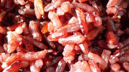 Delve into the mesmerizing blend of Riceberry and Jasmine rice, a tapestry of hues ranging from deep purple to ethereal translucence, each grain glistening with a polished allure.
