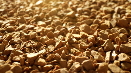 In the gentle glow of soft light, freeze-dried coffee granules unveil their charm. Irregular,...