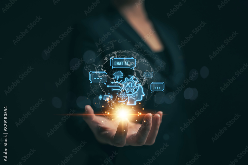 Fototapete Businessman chatting with AI. The concept of inserting commands to allow artificial intelligence to create something from data. Future technology. Using AI to help in work.
