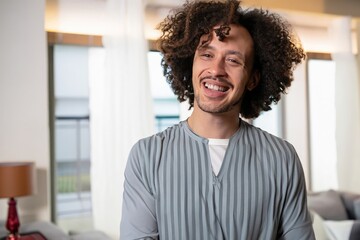 portrait of a man, afro american guy, latino at home, young man laughing