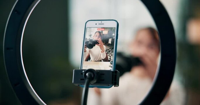 Woman, influencer and home vlog with smartphone, talking and product review with camera for followers. Online, streaming platform and content creator, social media and internet website in living room