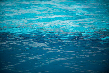 Obraz premium Blue ripped water in swimming pool, water pool texture and surface water backgraund.