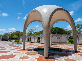 Curved architecture dome over fountain decorated in front of Jame' Asr Hassanil Bolkiah Mosque, named after 29th and current Sultan of Brunei in Bandar Seri Begawan, capital city of Brunei Darussalam.