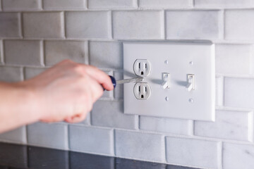 Close-Up of Electrical Outlet Repair Symbolizing Home Maintenance