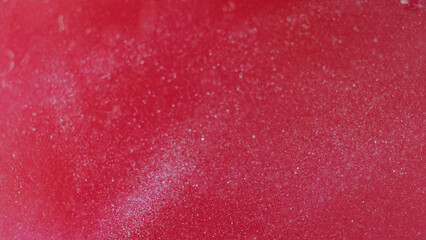 Sparkling texture. Shimmer ink. Defocused red color luxury particles moving brilliance whirlwind...