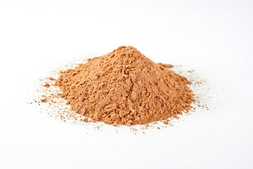 Heap of brown powder on white background