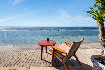 Empty beach chair with tropical beach and sea view, Summer vacation and Travel concept