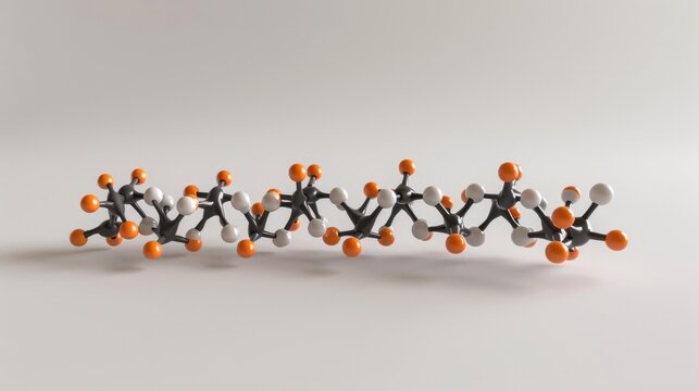 molecular model on a white surface. The molecule is ball-and-stick  model with different colored spheres connected by sticks.