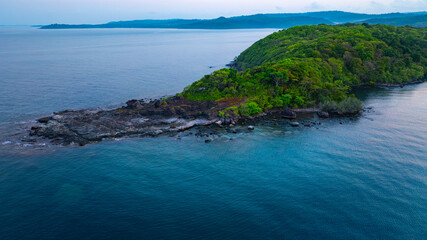 Fototapeta premium Aerial view of islands, Andaman Sea, natural blue waters and forests, tropical sea of Thailand. Beautiful scenery of the island with beautiful nature. 
