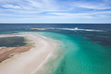 Aerial view of the turquoise ocean at Lancelin Beach in Western Australia with Edwards Island off...