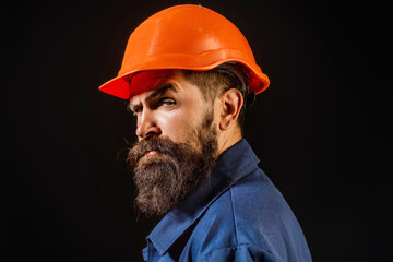 Worker in hardhat. Construction Worker with helmet. Worker in helmet at building. Portrait of Engineer Builder with Helmet. Worker from building site. Workers helmet and uniform.