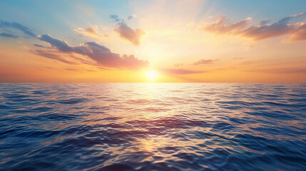 Fototapeta premium A beautiful sunset over a calm ocean.