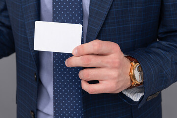 Pay by transaction. Businessman with credit card, closeup. Business deal and banking. Success of...