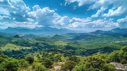Obraz premium The sky is blue with clouds and the mountains are in the background