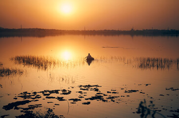 majestic evening view at Baranti lake (a popular travel spot in Purulia), with holden hued last...