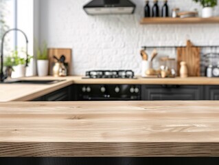 Wooden table top view for product montage over blurred kitchen interior background in a Scandinavian design, with light wood cabinetry, sleek black fixtures, and an emphasis on natural light