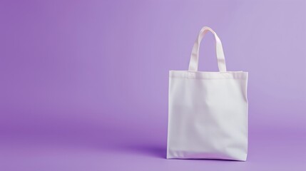 Mockup of a a plain white canvas tote bag with handles, set against a pastel purple background, perfect for eco-friendly shopping or branding.