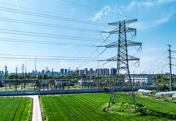 Electricity towers and substations on a sunny day